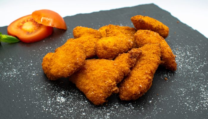 Chicken Nuggets vom Imbiss Fritz in Bielefeld: Knusprige Hähnchenteile, außen goldbraun und innen zart – perfekt kombiniert mit unseren leckeren Dips.