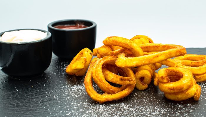 Wedges vom Imbiss Fritz in Bielefeld: Knusprig gewürzte Kartoffelecken, goldbraun gebacken – die perfekte Beilage zu Burgern, Schnitzeln und mehr.